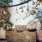 Spa Hotels Barcelona - Traditional oriental hammam pool on exotic resort spa terrace decorated with lush plants and stylish lanterns