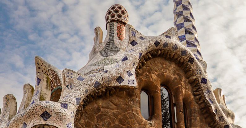 Park Güell - Brown and White Building under Blue Sky