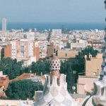 Viewpoints Barcelona - Surrealistic architecture of towers and gardens against modern cityscape in sunny summer day in Spain