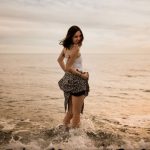 Barcelona Coast - woman in body of water