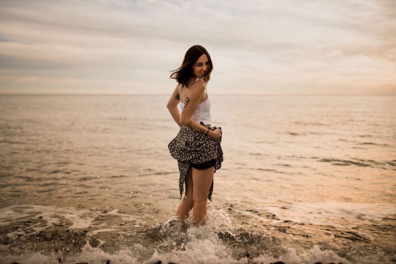 Barcelona Coast - woman in body of water