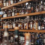 Alcohol - assorted-color bottle lot on shelf