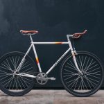 Bike - gray fixie bike leaning on black wall