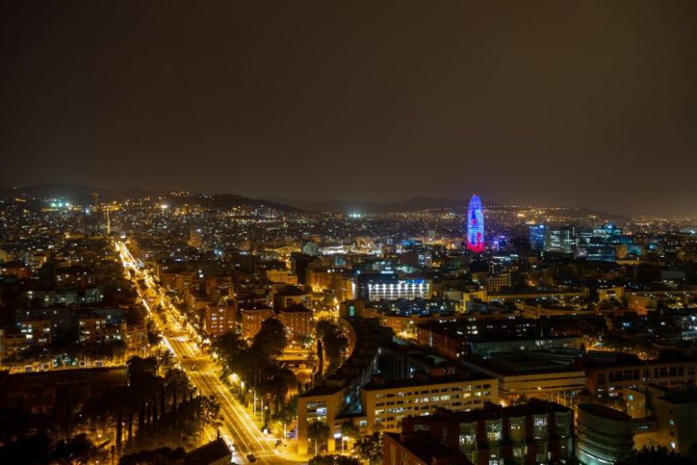Barcelona Night - aerial photo of lighted city buildings
