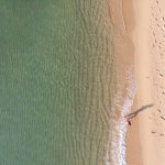 Barcelona Beach - person standing near shoreline