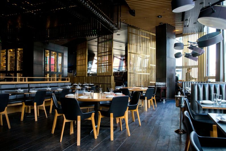 Restaurants - photo of pub set in room during daytime
