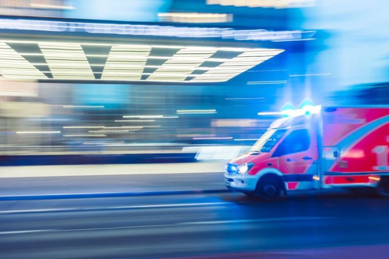 Emergency - red vehicle in timelapse photography